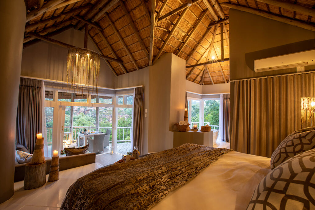 Clifftop Exclusive Safari Hideaway — bedroom, deck, view