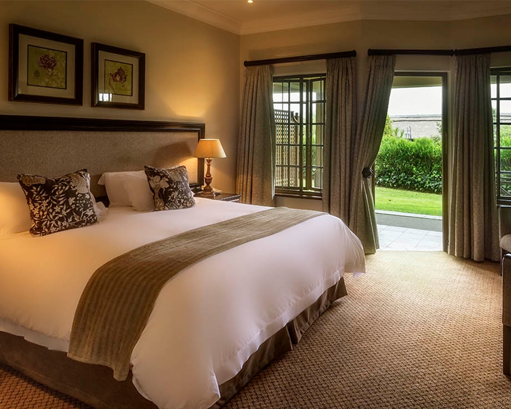 Champagne Sports Resort – Ground Floor Family Room Main Bedroom And Veranda With Hotel View