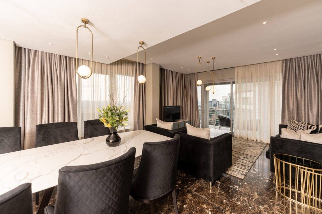 @Sandton Hotel — presidential suite dining area, room lounge