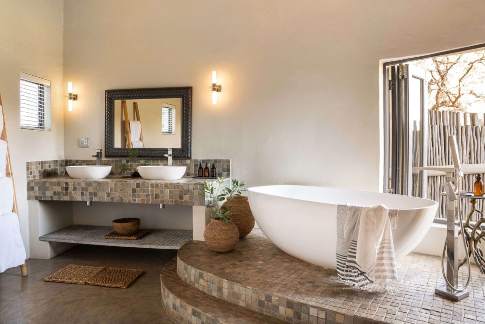 Simbavati River Lodge — room chalet bathroom