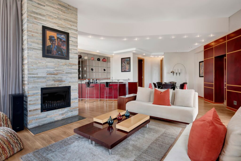 African Pride Melrose Arch, Autograph Collection – sofas, coffee table, fireplace