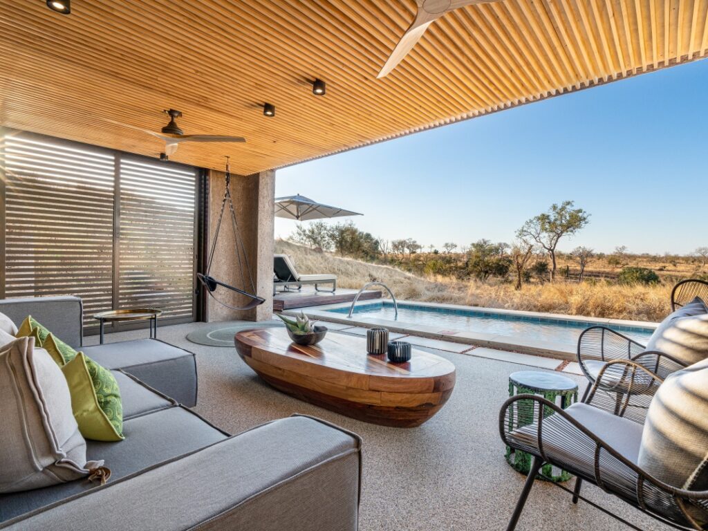 Immerse in breathtaking bush views from your Sabi Sabi Earth Lodge suite, where nature's beauty unfolds.