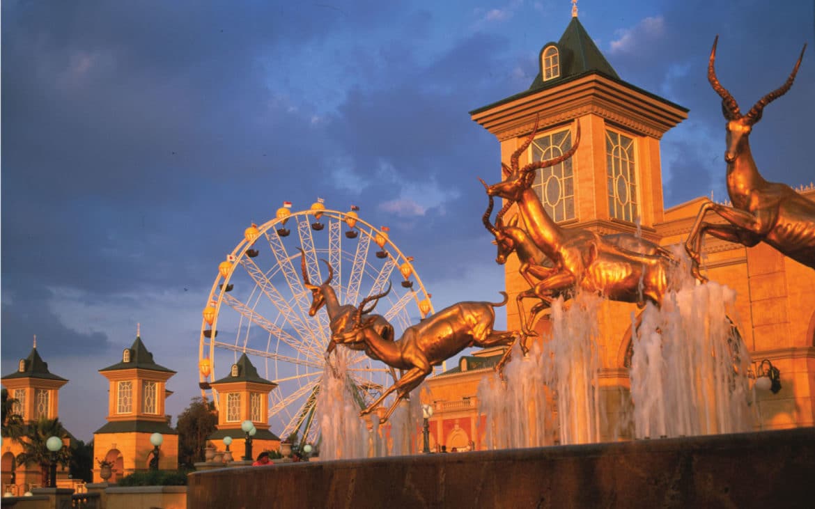 Gold Reef City theme park — the Ferris wheel and Victorian-style buildings