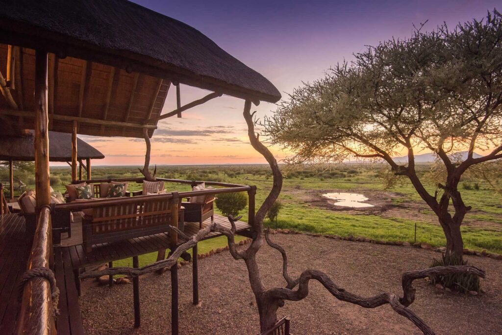 Tau Game Lodge, Madikwe — the deck above the waterhole at sunset