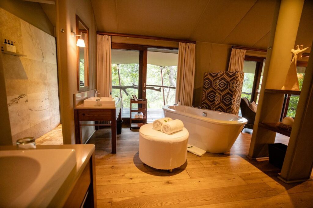 Freestanding bath and vanity inside a Kapama Buffalo Camp luxury tent