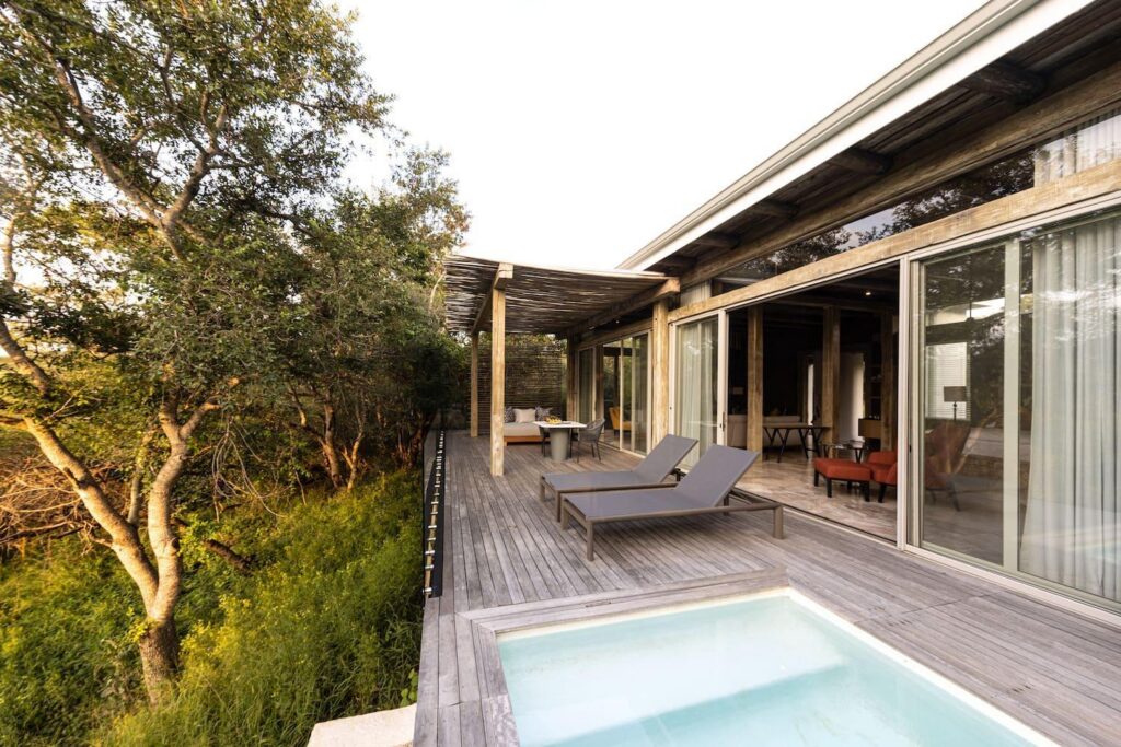 Private plunge pool and sun loungers on a Kapama Karula villa deck